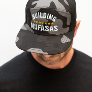 Camouflage Building Mufasas embroidered hat worn from front view